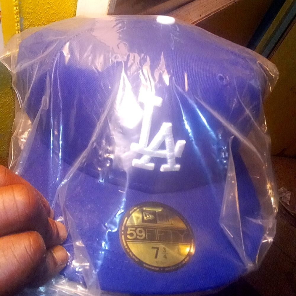 Mlb official on the field cap size 7 3/4 brand new never wore too big